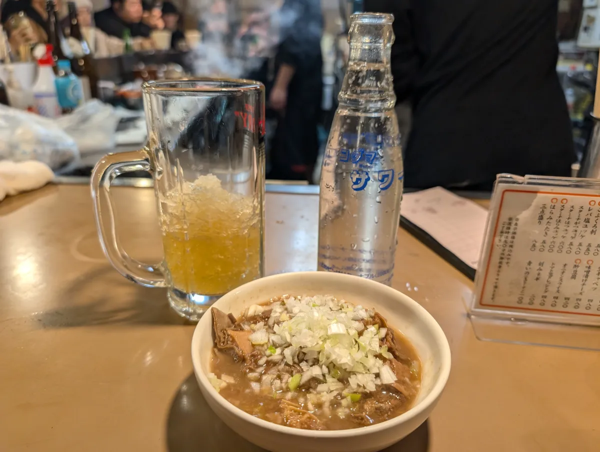 Motsuni stew and lemon sour at a Shinjuku izakaya