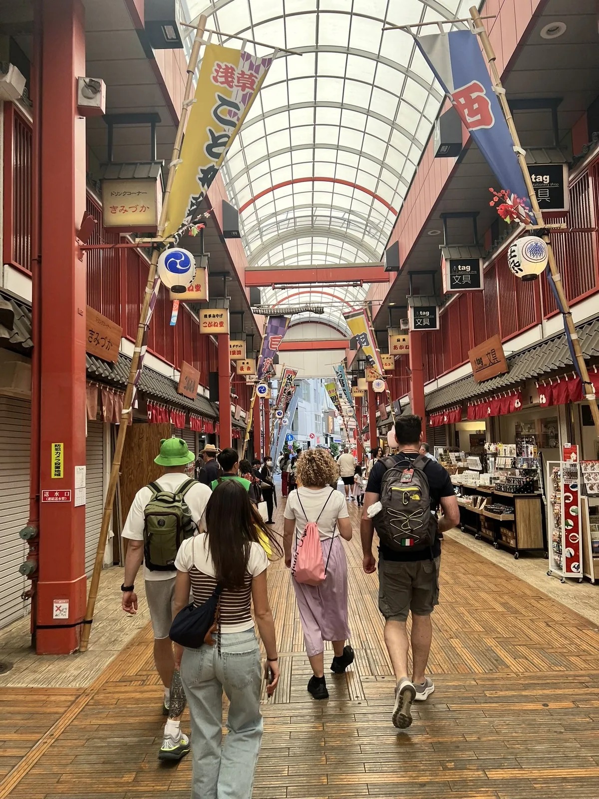 Tour guests walking the Nakamise-dori shopping street in Asakusa